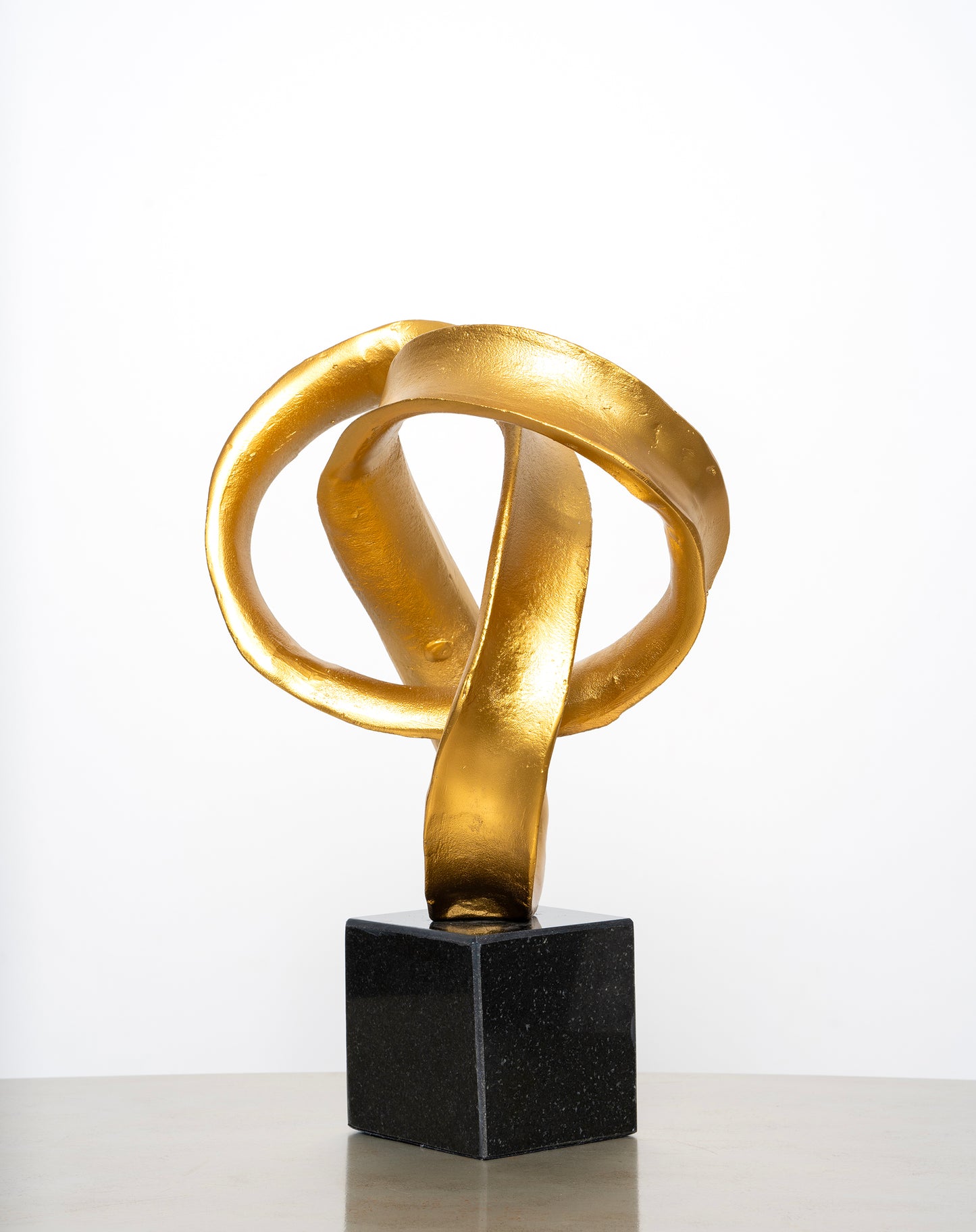 Sculpture on Granite Base, Gold